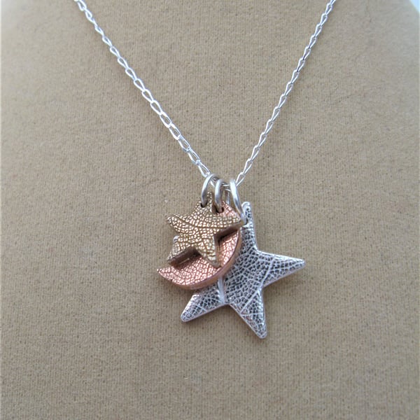 Moon and stars necklace in silver, copper and bronze