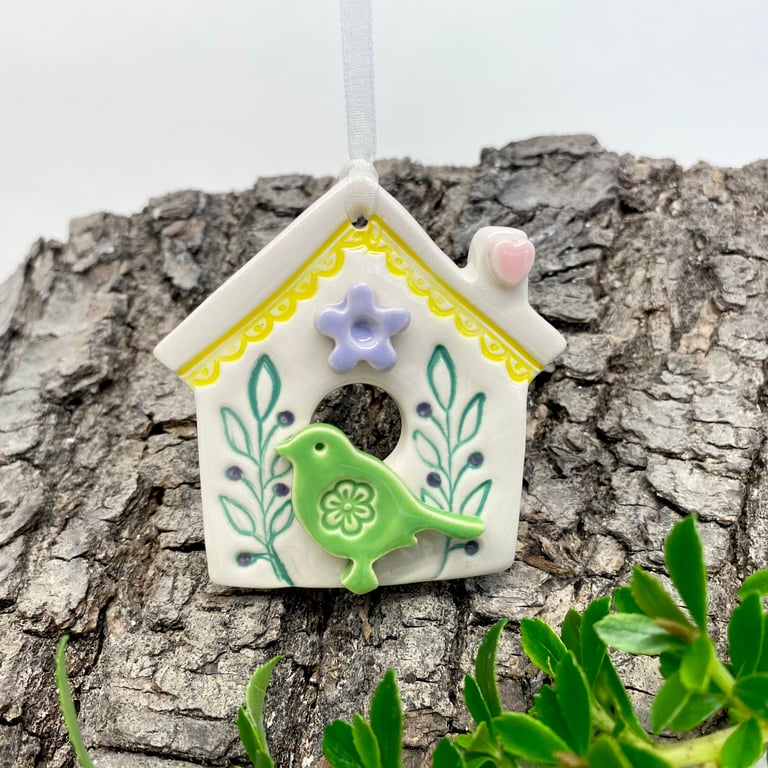 Small Ceramic bird house with lilac flower