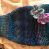Cosy hand knitted chunky hot water bottle cover