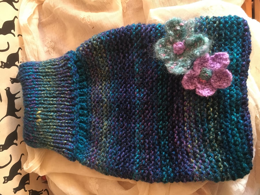 Cosy hand knitted chunky hot water bottle cover