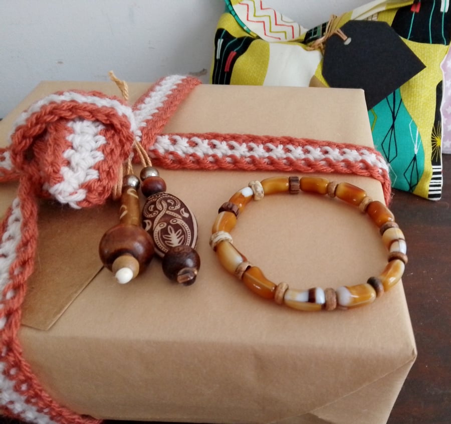 Handmade bracelet made using pre-loved beads.