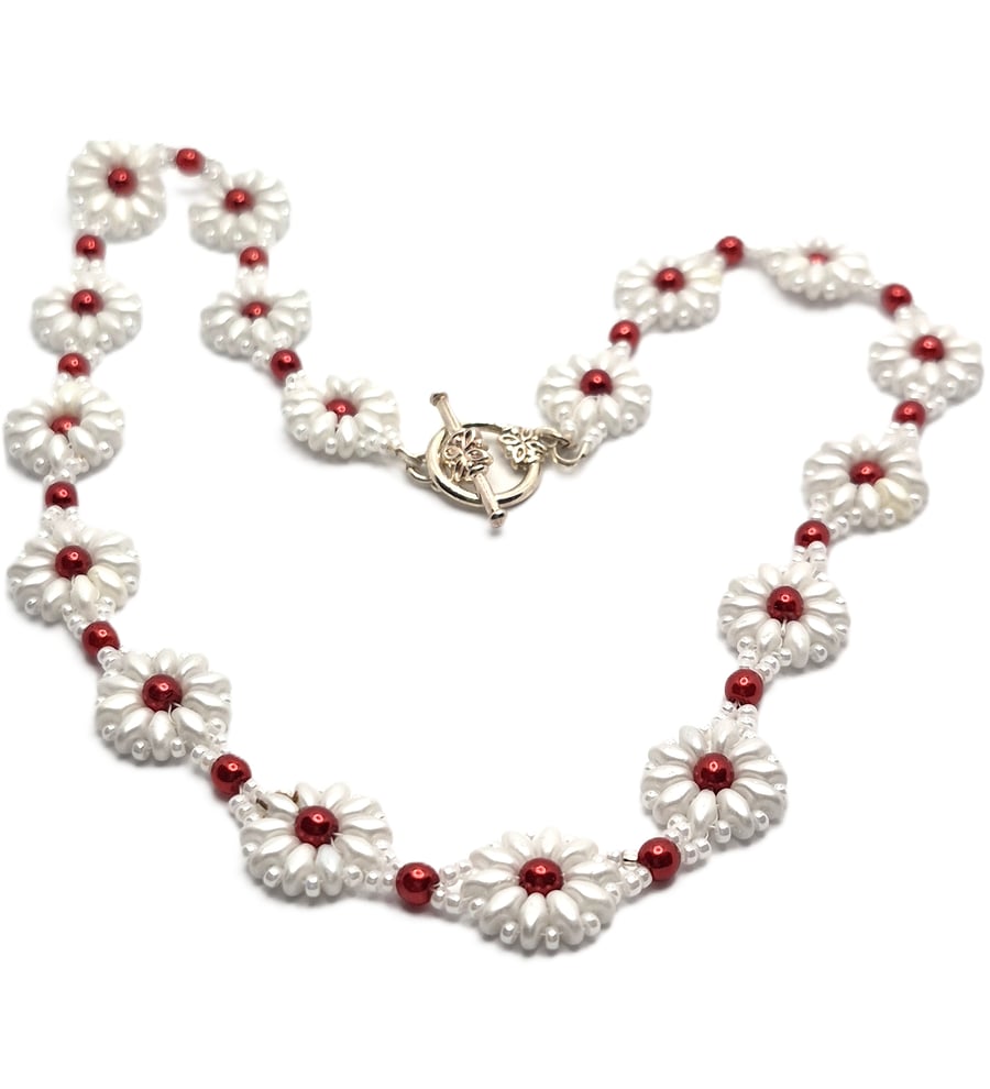 Daisy collection necklace with red faux pearls