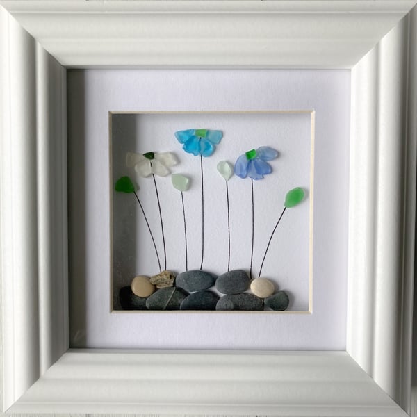 Framed floral wall art made with beach finds from Cornwall 