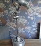 A one off metal lamp - perfect for reading or as mood lighting