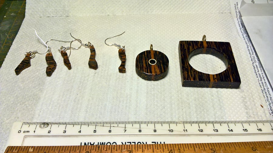 earing and pendant set of palm wood  with silver placed hoops