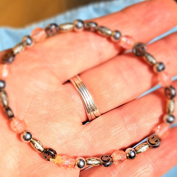 Smiley face beaded bracelet with pink beads and silver spacers 80's vibe
