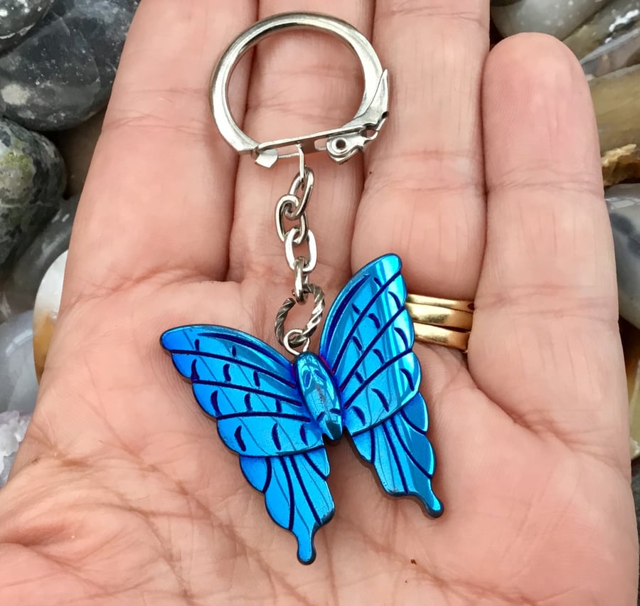 Electric Blue Butterfly. Titanium Rainbow Hematite Gemstone Keyring.