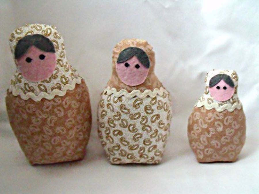 beige graduated russian matryoshka nesting display art dolls