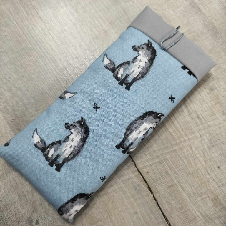 Glasses case with foxes on blue background
