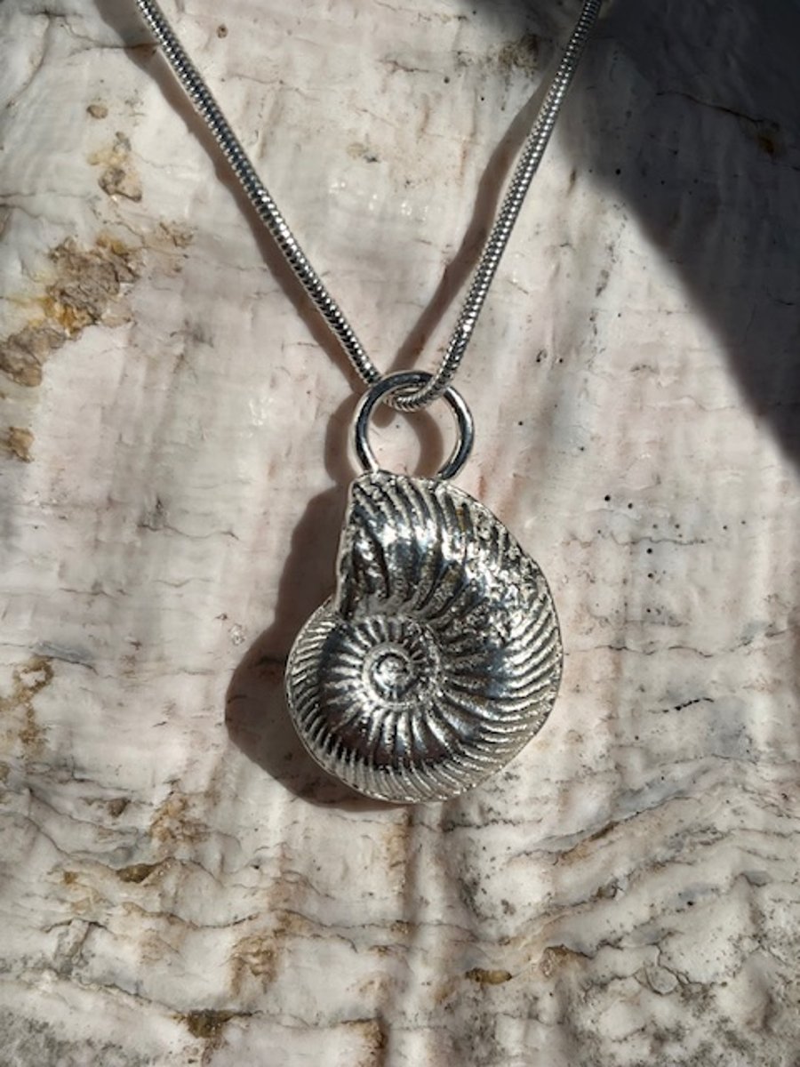 Sand cast silver ammonite pendant