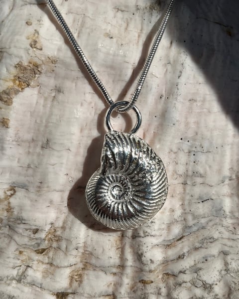 Sand cast silver ammonite pendant