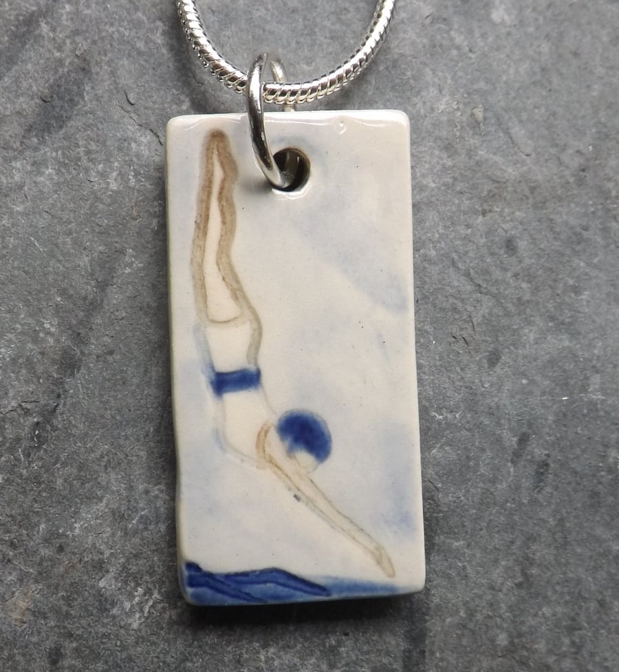 Diving Belle handmade ceramic pendant in blue and white