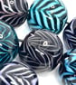 Handmade zigzag patterned lamp work glass beads
