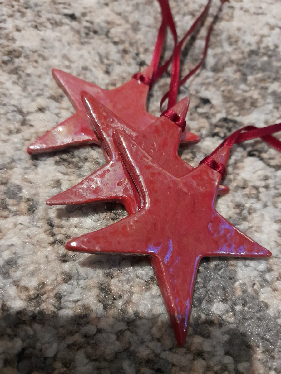 Red handmade ceramic star hanging decoration