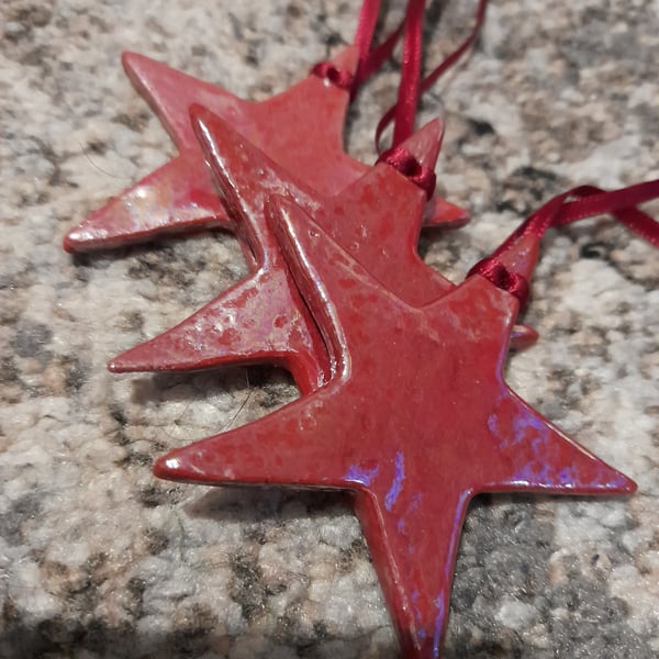 Red handmade ceramic star hanging decoration