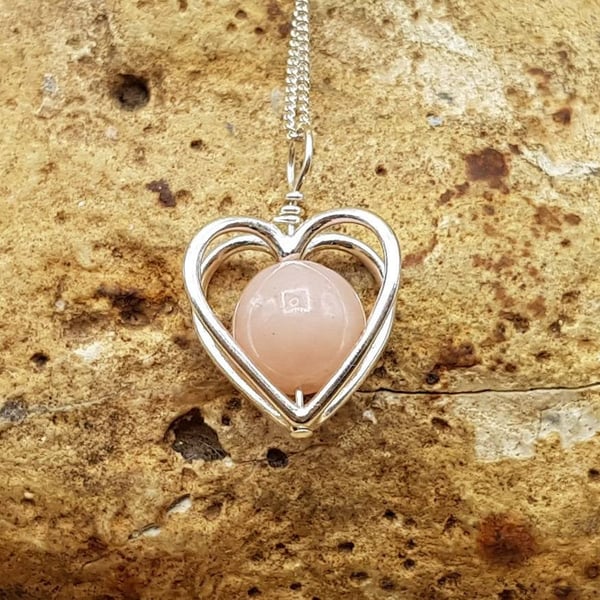 Minimalist pink Opal heart pendant. October birthstone