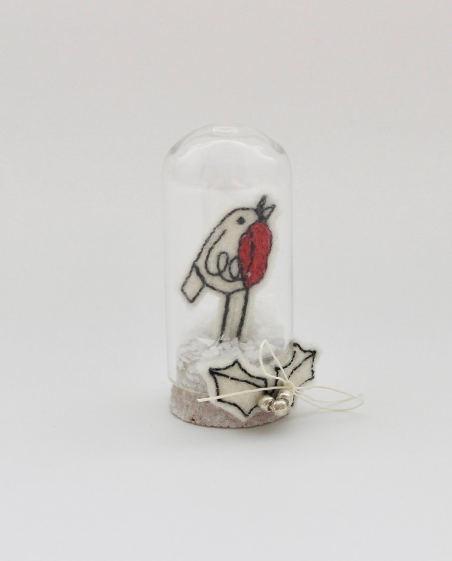 A Miniature Robin within a Glass Dome