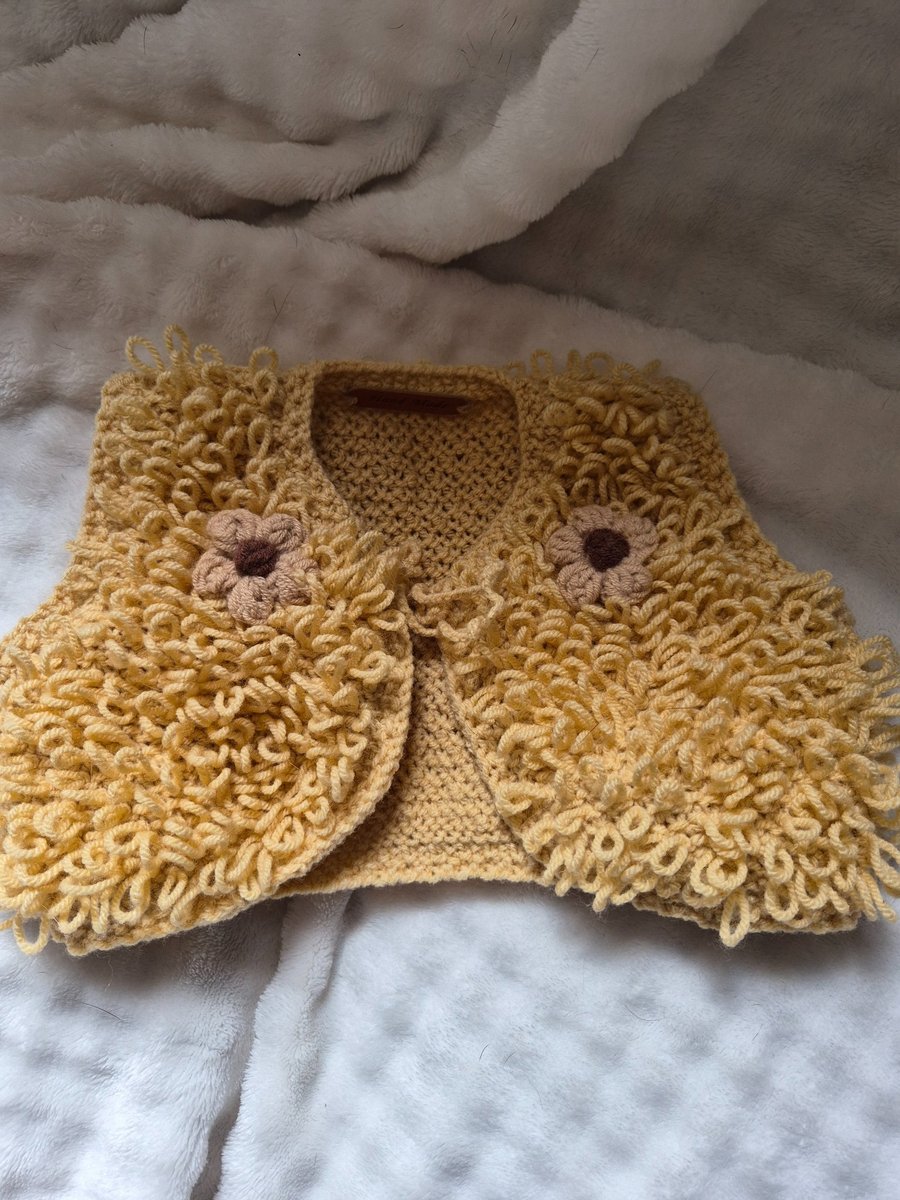 Girls handknit loopy bolero with flowers