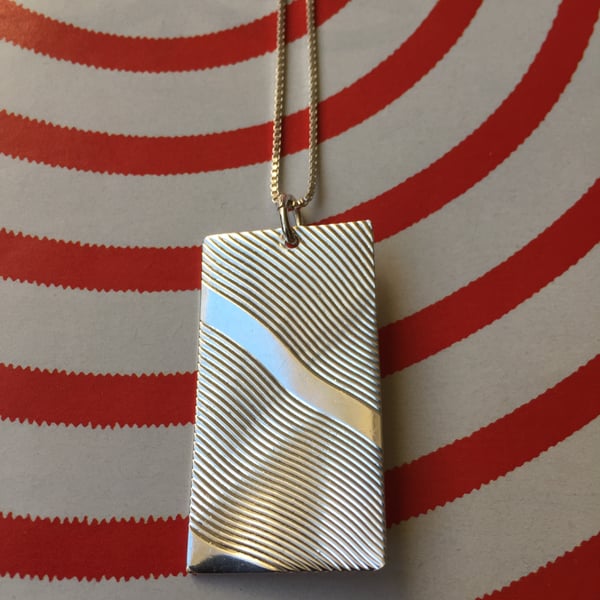 Silver sunbeam necklace