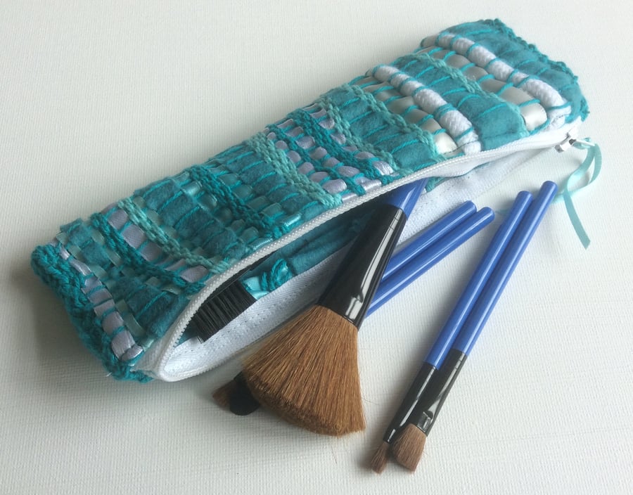Turquoise, zipped, woven make up bag or pencil case