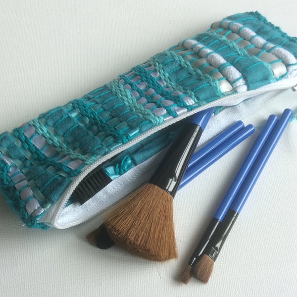 Turquoise, zipped, woven make up bag or pencil case