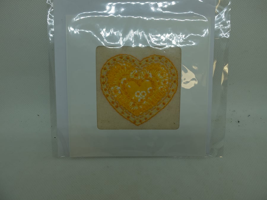 Hand appliqued and embroidered card. Yellow heart