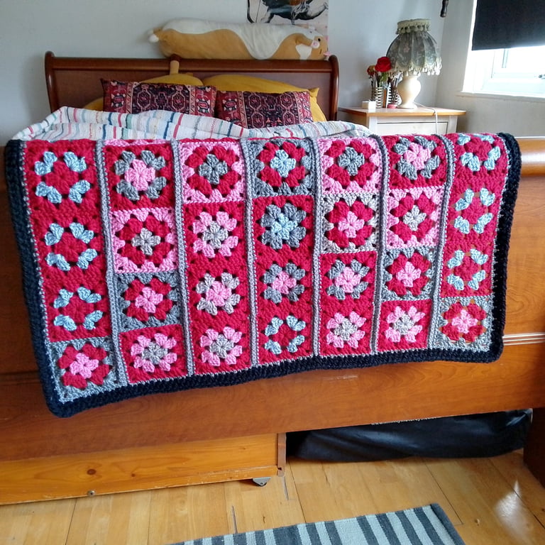 baby or toddler blanket in a red and grey theme.