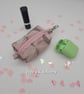 Bag charm box purse pouch pink geometric clip on. 