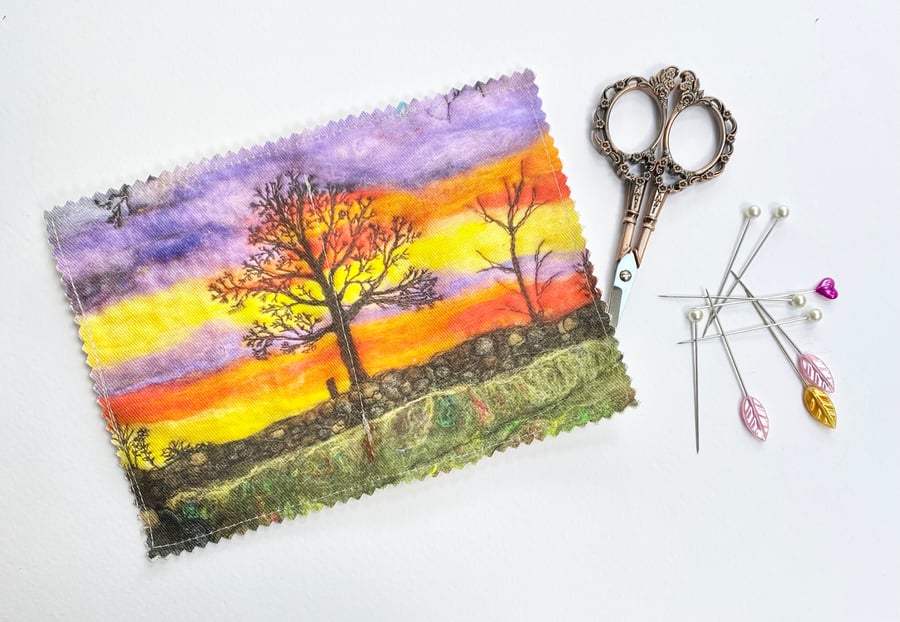 Sunset countryside sewing needle and pins case. 