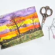 Sunset countryside sewing needle and pins case. 