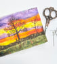 Sunset countryside sewing needle and pins case. 