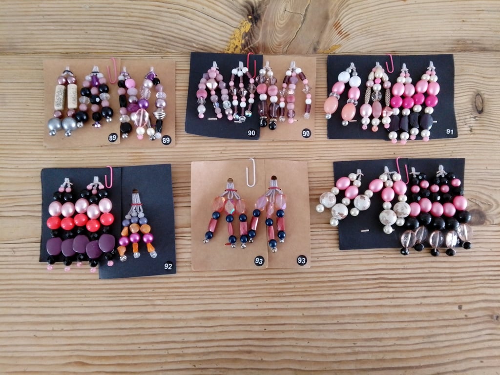 Sets of colour coordinated beaded gift decorations.