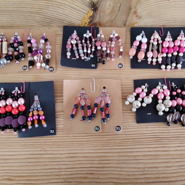Sets of colour coordinated beaded gift decorations.