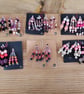 Sets of colour coordinated beaded gift decorations.