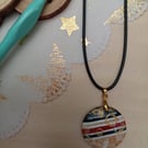 Red and black patterned hand painted wooden necklace 