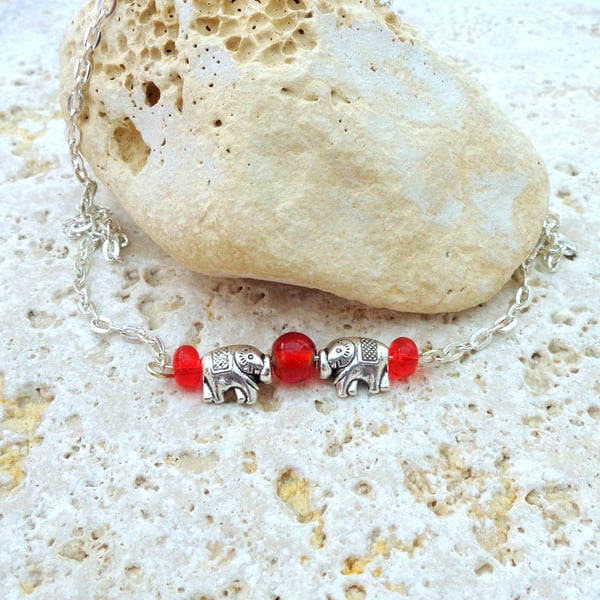 Necklace chain and bar with elephants & red glass beads