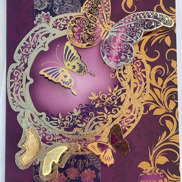 Dramatic burgundy butterfly with love card