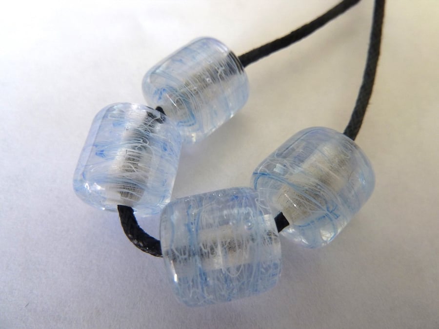 blue and white whispy lampwork beads
