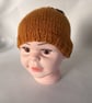 Children's Hand Knitted Hat with Leaf Detail