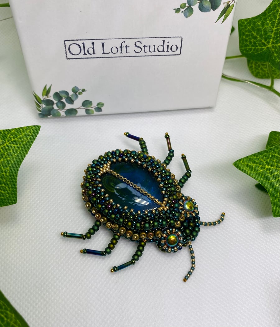 Handmade beaded beetle brooch
