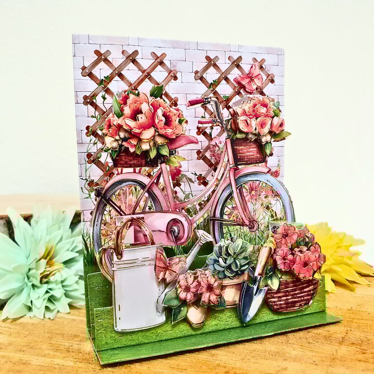 Small 3D decoupaged pop-up stepper note card with pink bicycle in the garden