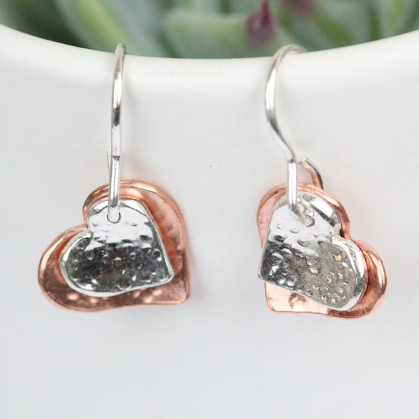 Silver and copper textured two heart drop earrings