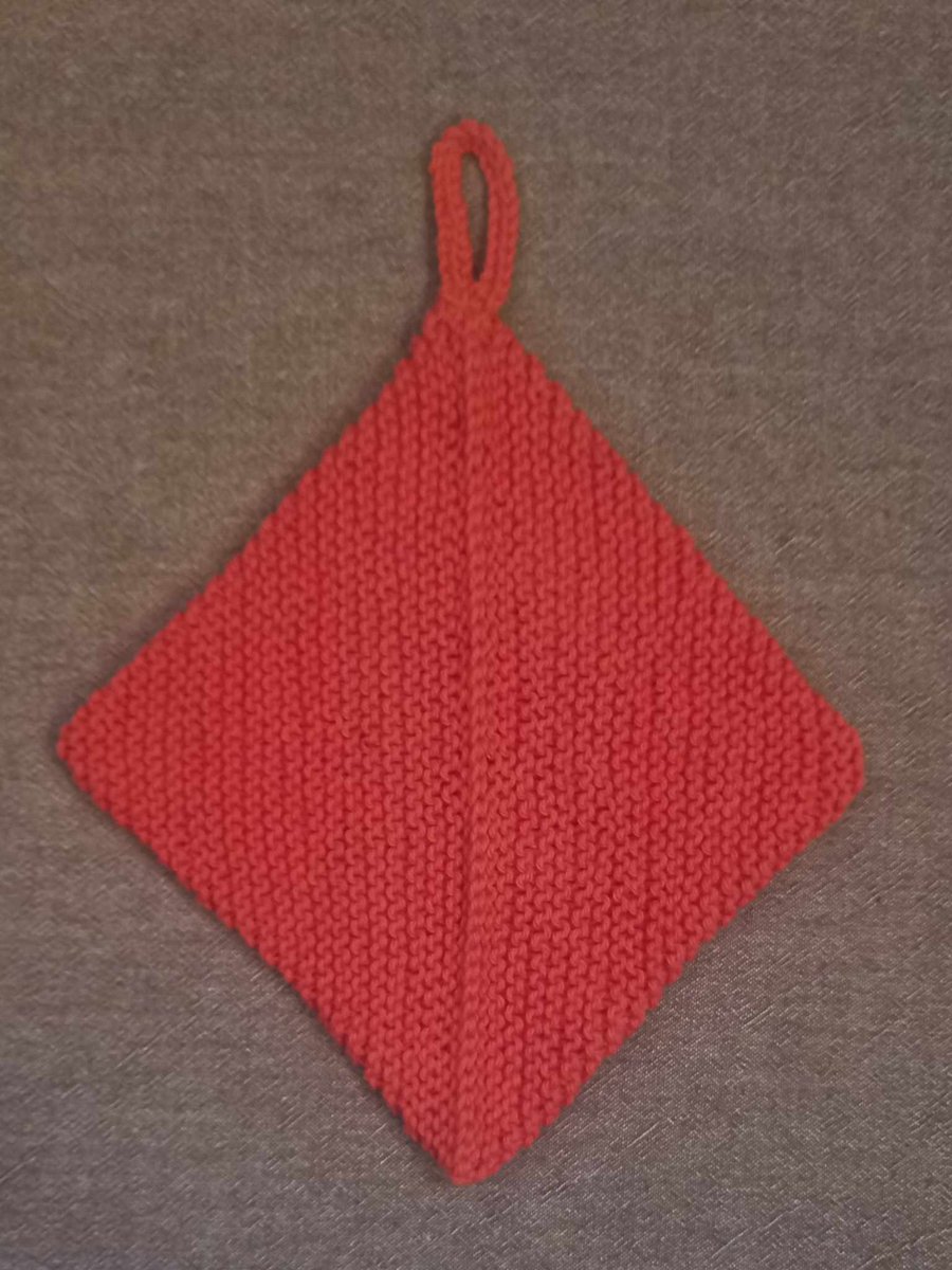 Hand knitted 100% cotton hot pot holder in orange