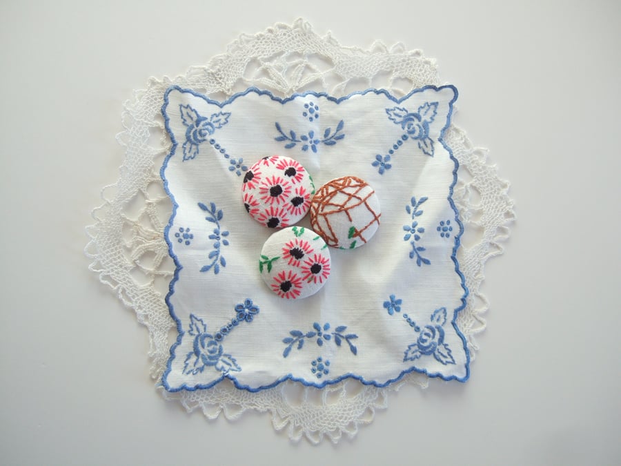 Three extra large buttons covered in vintage embroidery. 