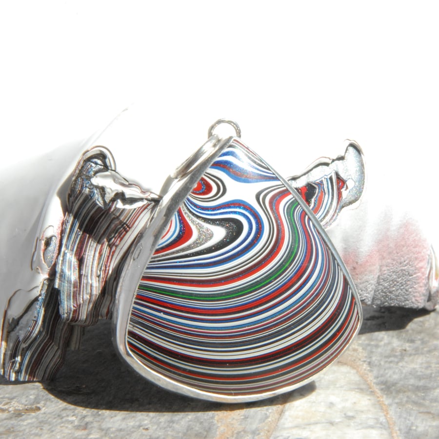 Kenworth fordite and silver pendant