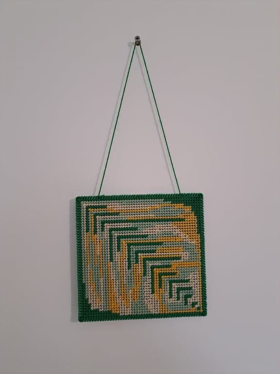 Wall art of an abstract leaf - adjustable hang length