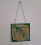 Wall art of an abstract leaf - adjustable hang length - Image 1