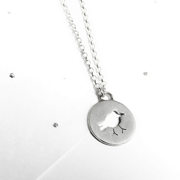 Cut out bird silhouette necklace