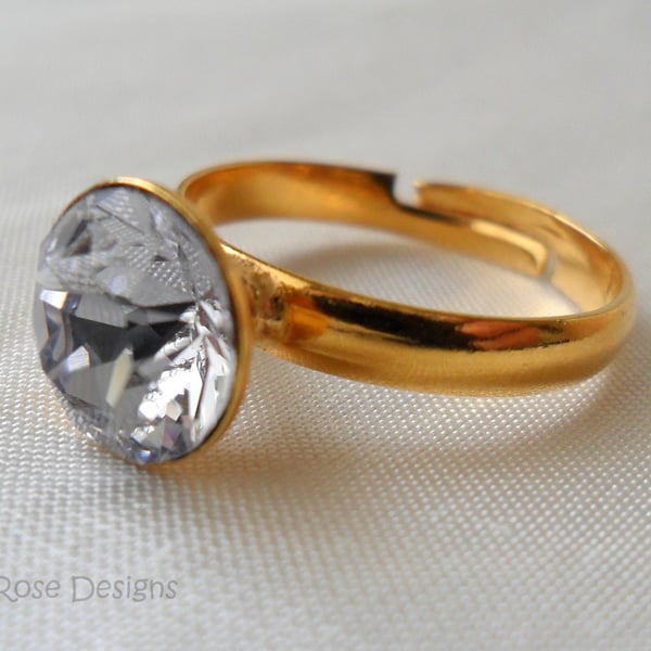 Adjustable ring with a mauve Swarovski crystal