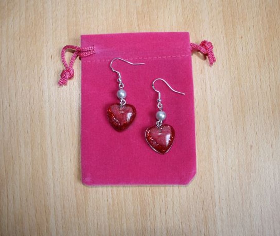 Red heart earrings with glass bead